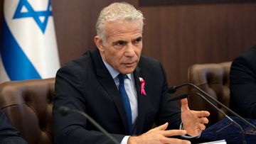 Israeli Prime Minister Yair Lapid makes a statement