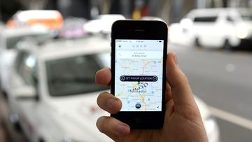 The ACT today announced Uber will be legalised from October 30. (AAP)