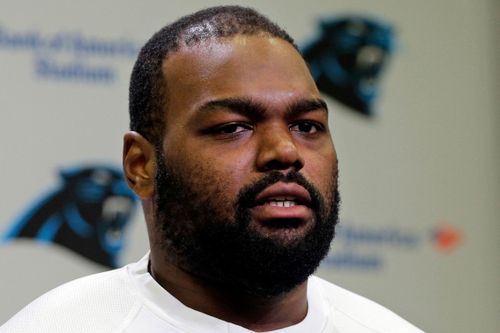 Carolina Panthers' Michael Oher speaks to the media