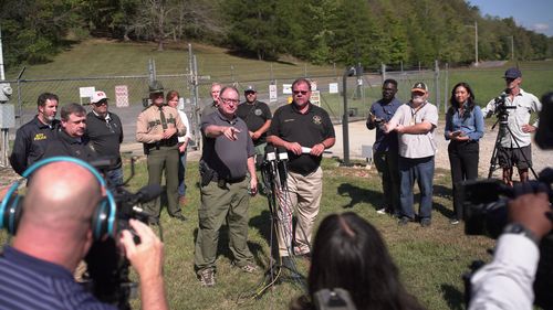 Humphreys County Sheriff Chris Davis tells reporters that no survivors were recovered from the blast at Accurate Energetic Systems, an explosives plant in Bucksnort, Tenn., during a news conference on Saturday, Oct. 11, 2025.  (AP Photo/Obed Lamy)