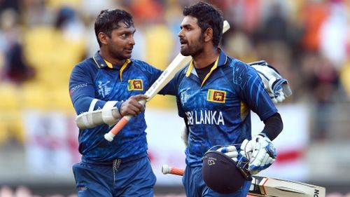 Kumar Sangakkara and Lahiru Thirimanne celebrate after hitting the winning runs against England. (Getty)
