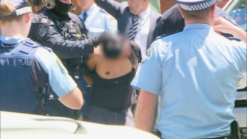 man arrested gladesville police attack