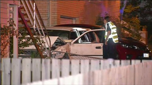 A teenager has been killed in a horror crash in Brisbane where a car came off a road, smashed through a fence and collided with a home.