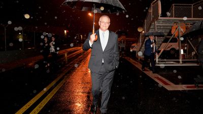 Scott Morrison leaves a media conference following the passing of Bob Hawke, at Brisbane Airport.