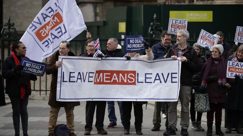 Demonstrators who want May to stick to the vote results already established.