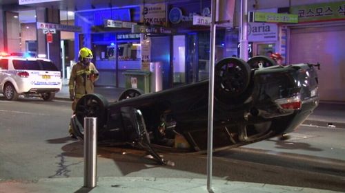 A car rolled over on Pitt Street, Sydney. (9NEWS)