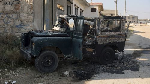A damaged vehicle belonging to the Syrian Government troops, seen in Kafr Halab, Aleppo countryside, Syria, Friday, Nov. 29, 2024. (AP Photo/Ghaith Alsayed)