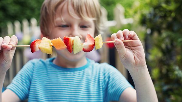 Child with fruit