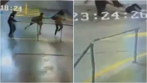 Confronting footage shows the young woman grabbed by her backpack and dragged across the concrete before allegedly being assaulted and having her bag stolen.