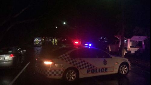 Emergency services at the scene of the police shooting in Ashgrove. (Sean Power/9NEWS)