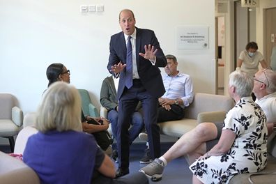 Prince William, centre, chats with the outpatients as he attends the official opening of the Oak Cancer Centre at The Royal Marsden Hospital in London, Thursday, June 8, 2023