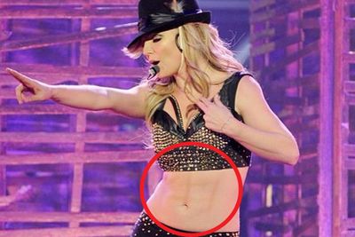 Ok, so not all retouch jobs are about tucking in (or creating a thigh gap!) <br/><br/>Take Britney Spears for example, who decided to Photoshop a set of abs onto her already slimmed-down bod. <br/><br/>And it looks FAKE, FAKE, FAKE. <br/><br/>PS. Brits, Ken doll called - he wants his plastic six-pack back.