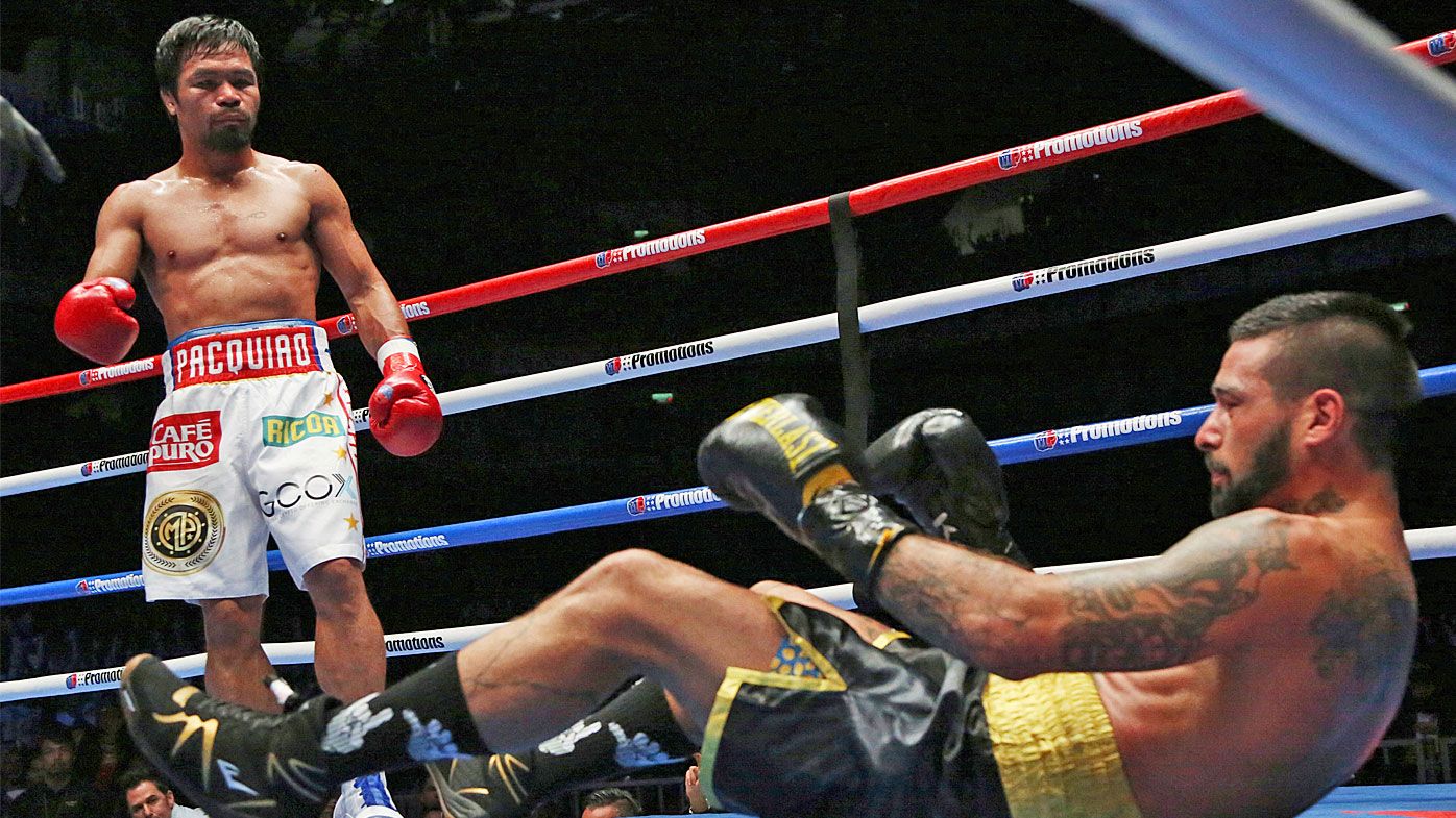 Manny Pacquiao scores seventh-round TKO against Lucas Matthysse to win WBA title
