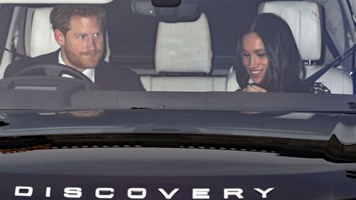 Prince Harry and Meghan Markle leave Kensington Palace. (Philip Toscano/PA via AP)