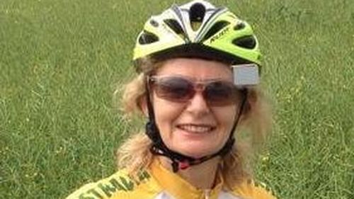 Woman killed in crash outside Brisbane hospital a keen traveller who 'cycled around the world'