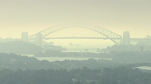 The smoke has shrouded landmarks like the Sydney Harbour Bridge.
