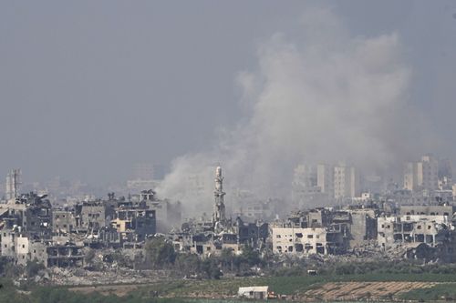 Smoke rises following an Israeli airstrike in the Gaza Strip, as seen from southern Israel, Saturday, Oct. 28, 2023. 