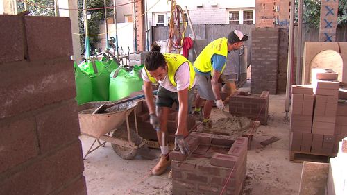 Métiers travaillant sur un chantier