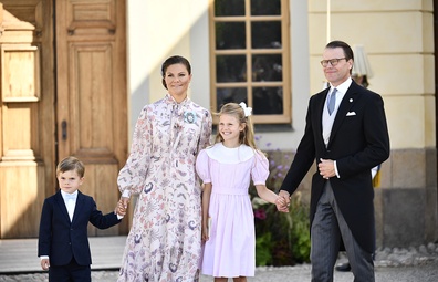 Sweden's Crown Princess Victoria, centre left with Prince Oscar, left, Princess Estelle and Prince Daniel, pose for a photo after the christening ceremony of Prince Julian at the Drottningholm Palace Chapel, in Stockholm, Sweden, Saturday, Aug. 14, 2021.