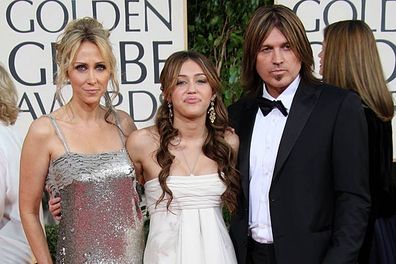 Miley with parents Billy Ray and Tish Cyrus
