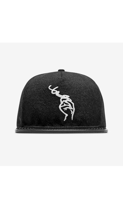 <a href="http://www.stampd.com/collections/all/products/poolside-hat-black" target="_blank">Hat, approx. $110, Stampd</a>