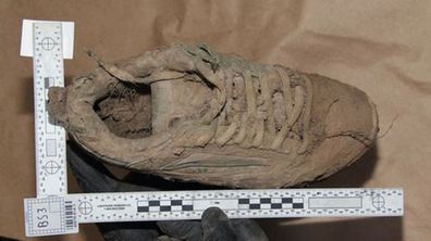 A muddy shoe, believed to be that of Daniel Morcombe, found at Glasshouse Mountains. (Supplied)