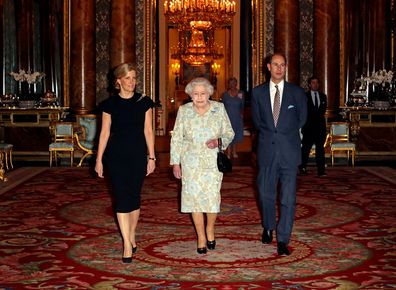 Queen Elizabeth II holds a reception at Buckingham Palce for The Duke and Countess of Wessex in 2015. 