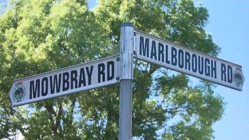 The woman was pulled over in a leafy family-friendly street in Sydney's north (9NEWS)