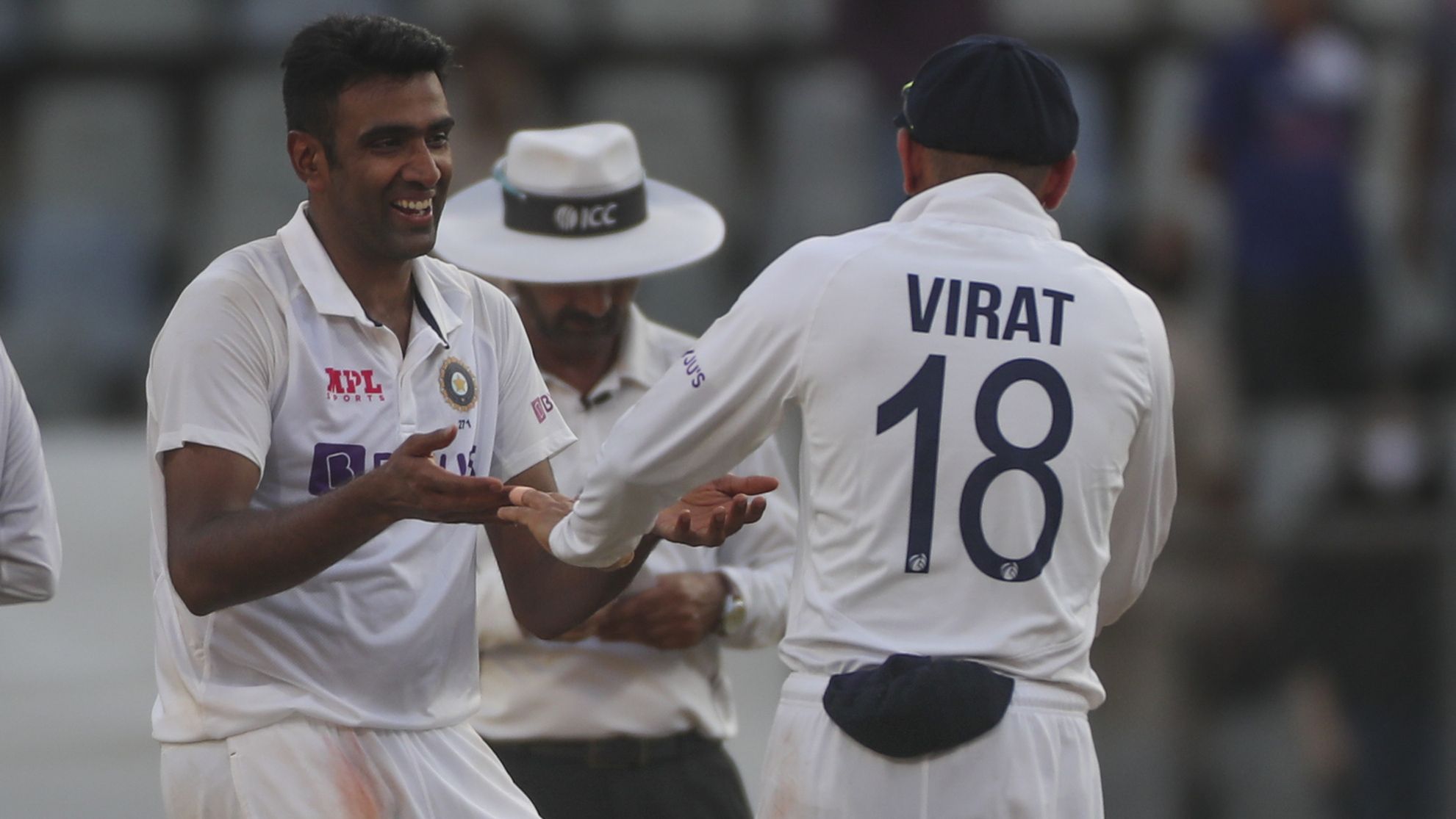 India&#x27;s Ravichandaran Ashwin shares a moment with Virat Kohli.