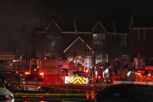 First responders work the scene after what witnesses say was a plane crash in Philadelphia, Friday, Jan. 31, 2025. (AP Photo/Matt Rourke)