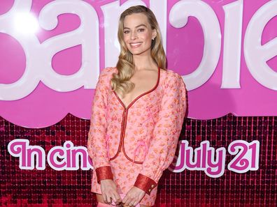 Margot Robbie attends a photocall on July 13, 2023 in London 
