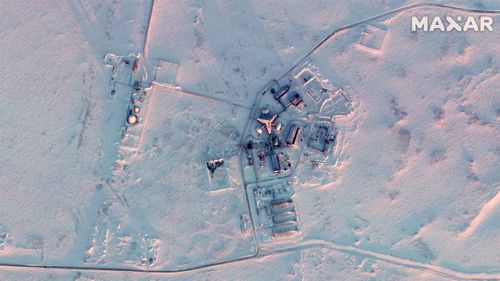 Russia's northernmost military facility, the airfield in Nagurskoye is one of several "trefoil" bases, featuring a three-ponged building painted in the colors of the Russian flag. Nagurskoye is seen here on March 16.
