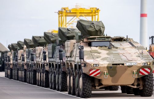 Armoured personnel carriers from the German army bound for the Trident Juncture exercises are parked before being loaded onto ships in the port of  of Emder in Emden, Germany.