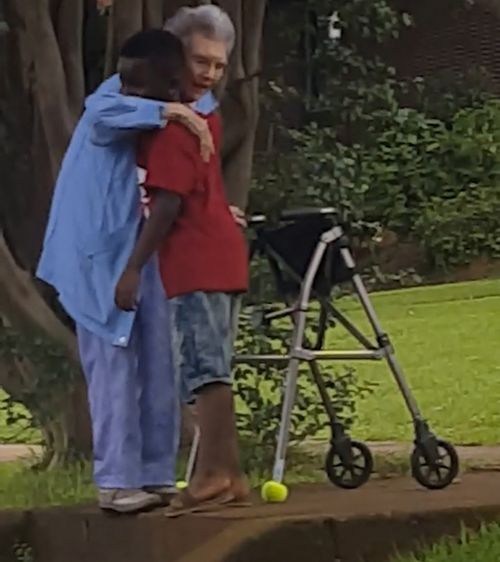 When they both reached the top of the stairs, Maurice offered the woman a hug and a smile before heading back to his car. Picture: Facebook.