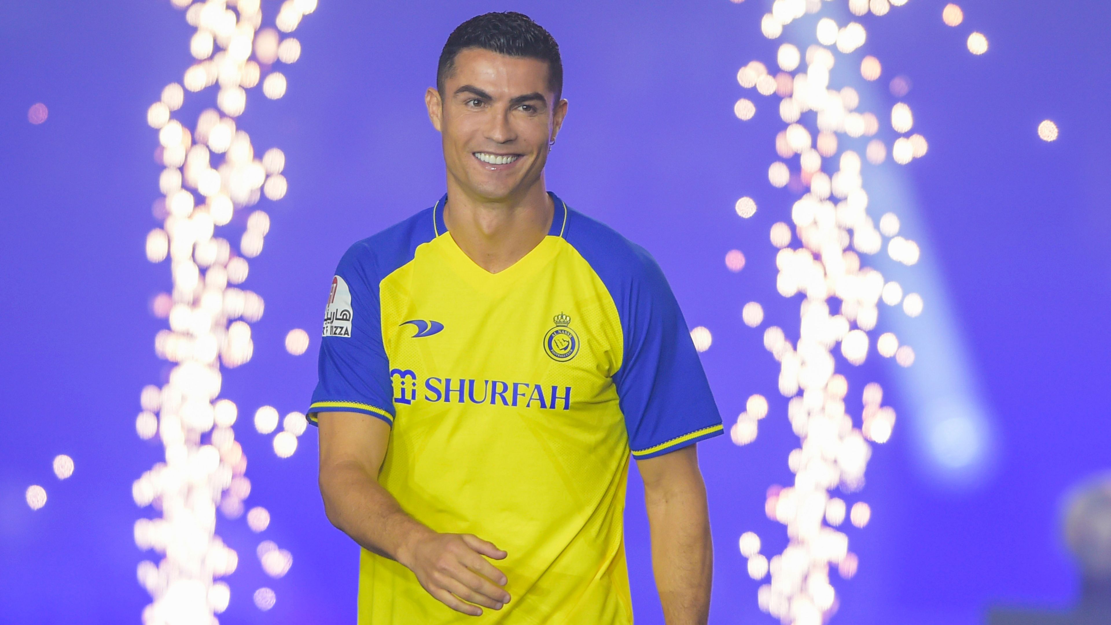 Cristiano Ronaldo smiles as he is unveiled as an Al Nassr player at Mrsool Park Stadium on January 3, 2023 in Riyadh, Saudi Arabia. (Photo by Khalid Alhaj/MB Media/Getty Images)