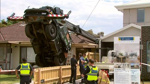 The crane is yet to be removed from the Altona home.