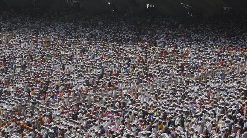 Thousands of Indians packed into the cricket stadium for Donald Trump's address.