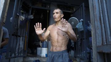 Former Colombian soldier Carlos Guerrero, accused of participating in the assassination of Haitian President Jovenel Moise, speaks with journalists inside the National Penitentiary in Port-au-Prince, Haiti, Sunday, March 3, 2024.