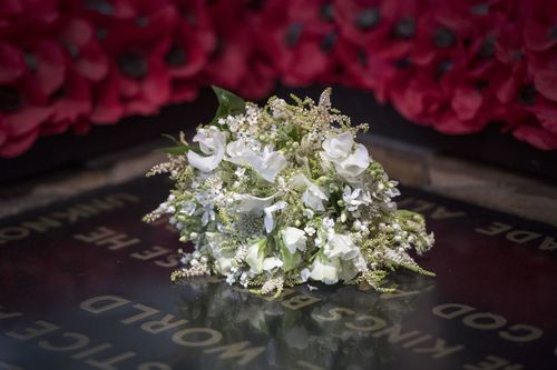 The bride's bouquet is a touching tribute in more ways than one. Picture: Getty