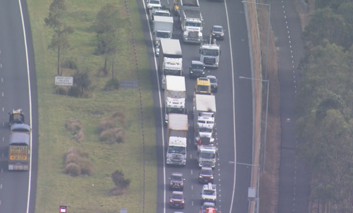 A truck rollover has caused heavy traffic on the M7 this morning.
