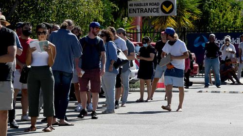 People line up outside the Centrelink in Osborne Park, Perth.