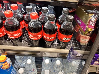 impulse buy supermarket checkout Coles Woolworths aldi iga