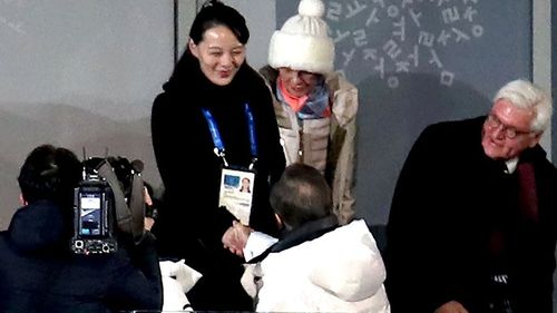 South Korean President Moon Jae (bottom) shakes hands with North Korea's Kim Yo-jong, sister of North Korean leader Kim Jong-un, during the Opening Ceremony of the PyeongChang 2018 Winter Olympic Games. (AAP)