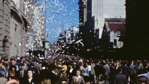 A ticker tape victory parade through Brisbane City in August 1945.