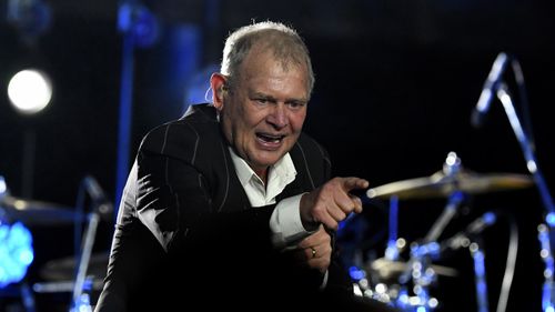 John Farnham, performs, on stage, concert