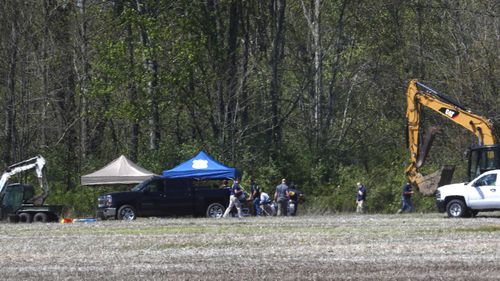 The FBI, Warren police and other agencies are digging through dirt and vegetation at the site in Macomb Township for the remains of Kimberly King, who was last seen in 1979.