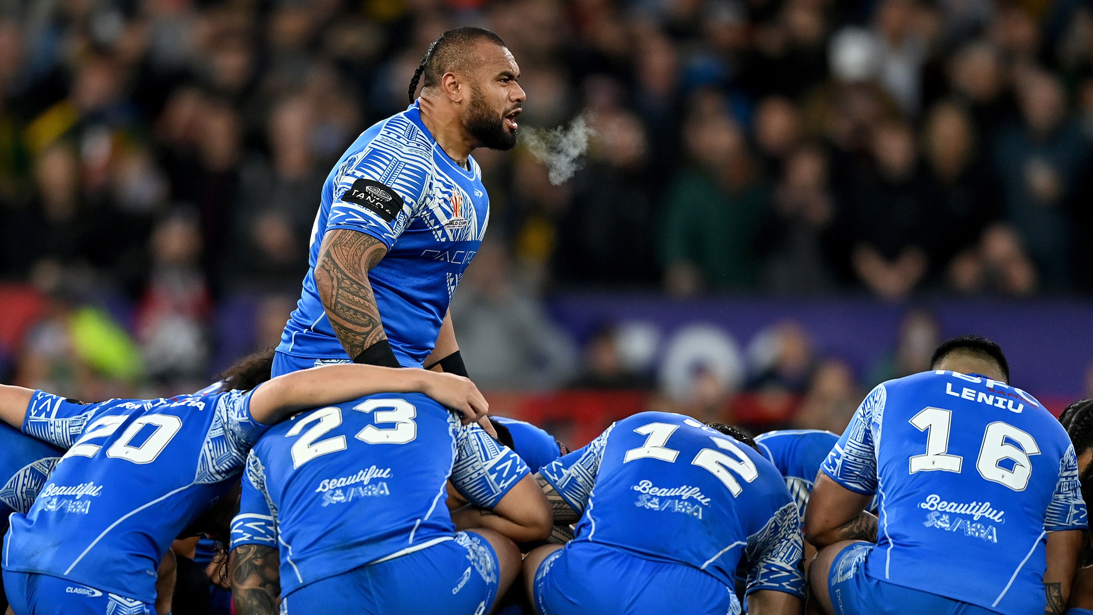 Junior Paulo of Samoa leads the Siva Tau prior to the Rugby League World Cup Final match between Australia and Samoa at Old Trafford on November 19, 2022 in Manchester, England. (Photo by Gareth Copley/Getty Images)