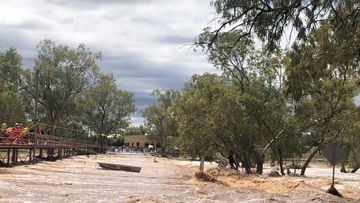 A rescue is underway at the Undoolya causeway in Alice Springs after a man became stranded.