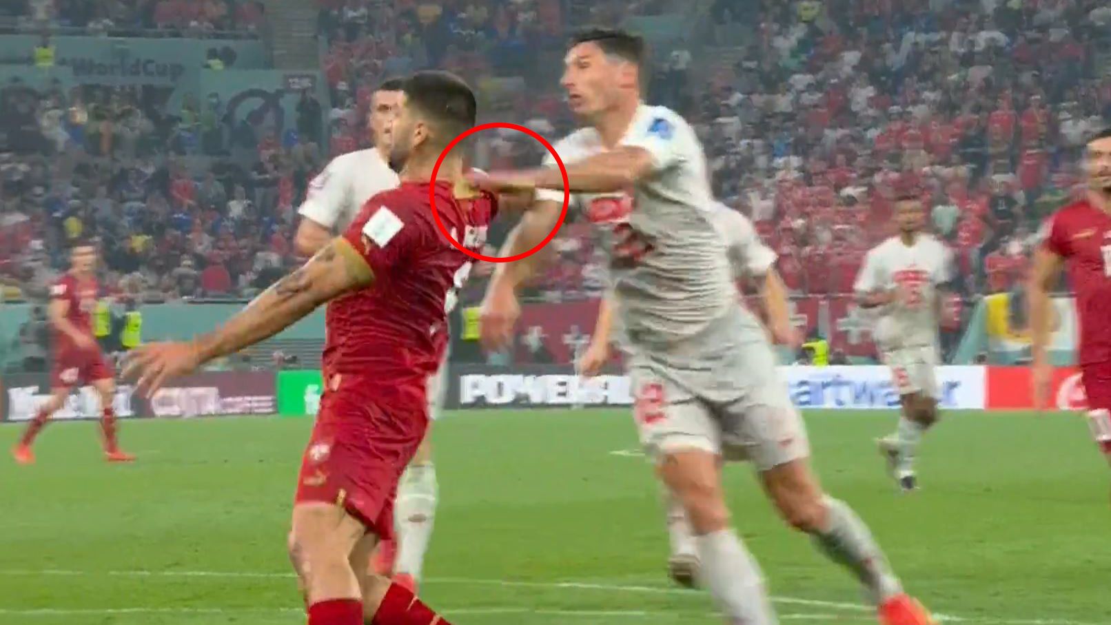 Serbian striker Aleksandar Mitrović appealed for a penalty after this contact against Switzerland at the World Cup.
