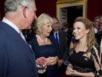 Kylie Minogue with Prince Charles and his wife Camilla, Duchess of Cornwall, 2012